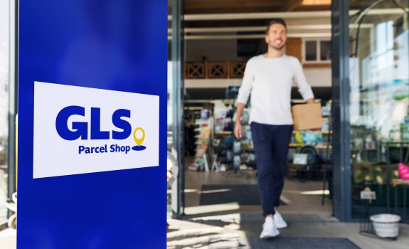 Man leaving a GLS Parcel shop