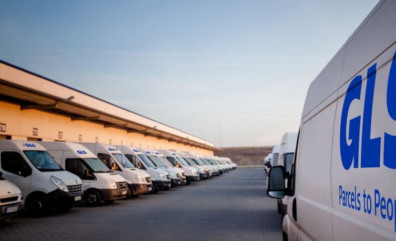 GLS delivery vehicles along the gates