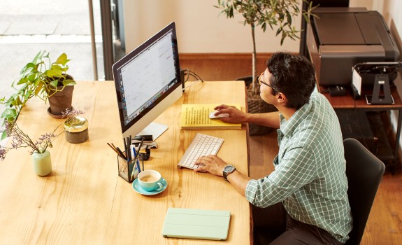 Person at desk with PC