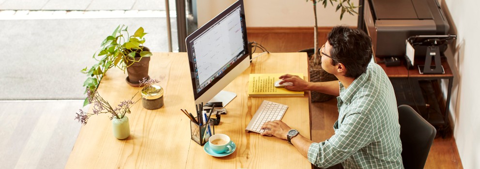 Person at desk with PC