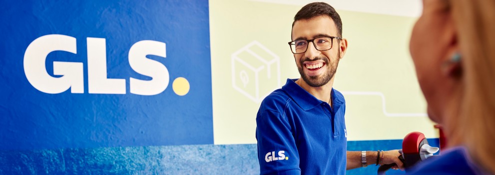 GLS employee wearing a blue polo shirt