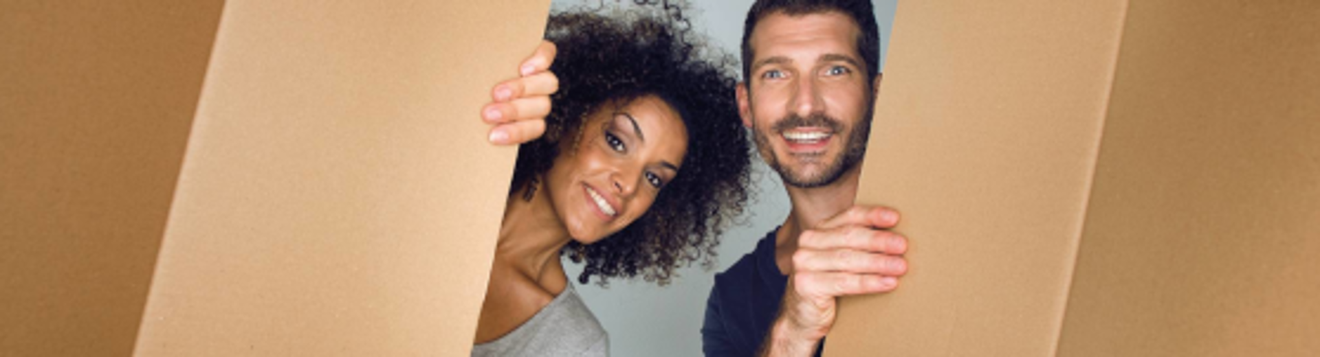 Couple looks through a box