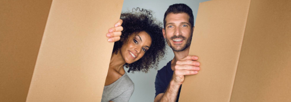 Couple looks through a box
