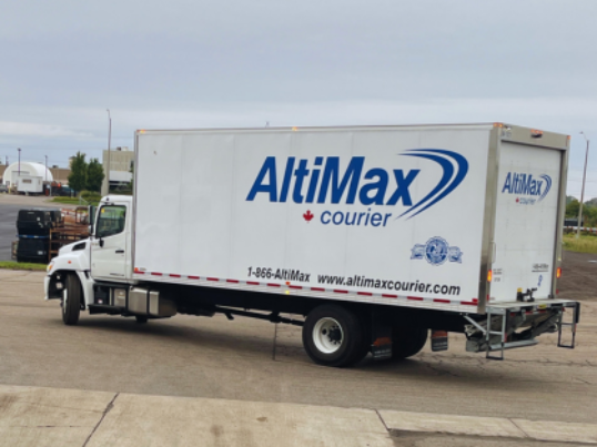 AltiMax truck in a parking lot.