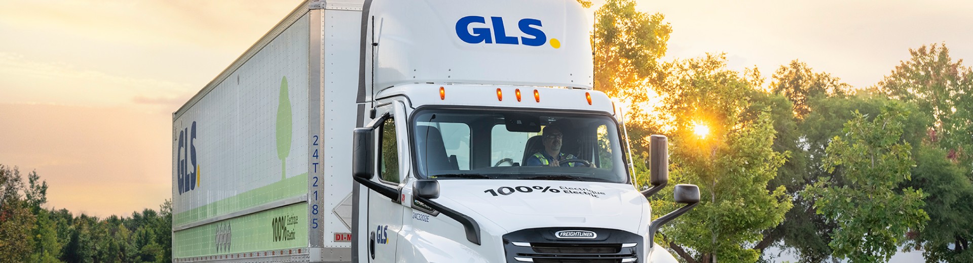 GLS Electric Truck in Laval at sunrise.