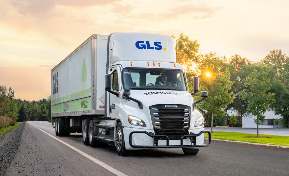 GLS Electric Truck in Laval at sunrise.