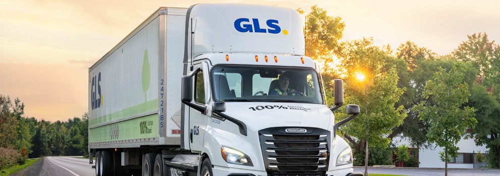 GLS Electric Truck in Laval at sunrise.