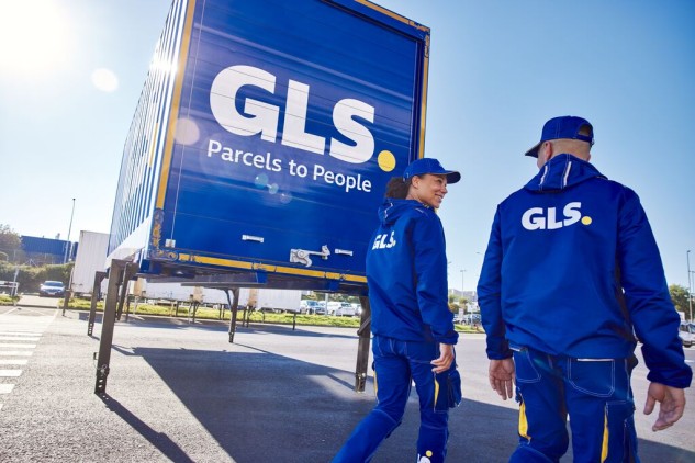 GLS workers next to a parcel transport truck