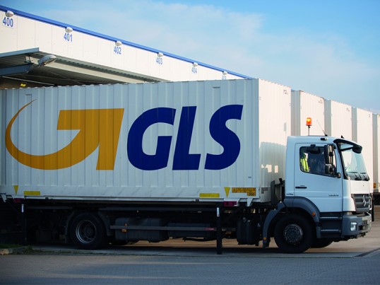 Truck leaving a GLS sorting hub