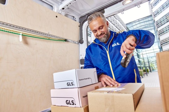 A man scans a parcel