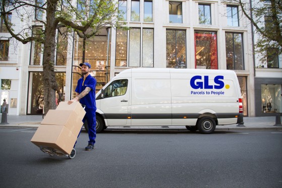 Label on a GLS parcel being scanned using a PDA
