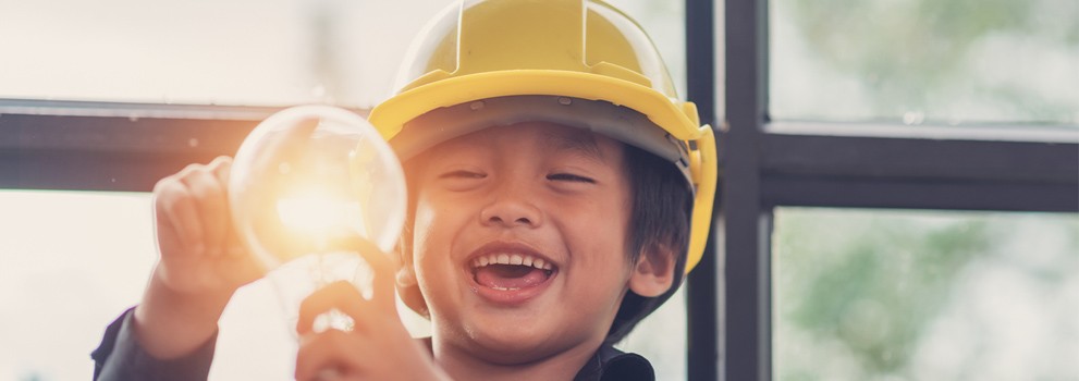 child with light bulb on