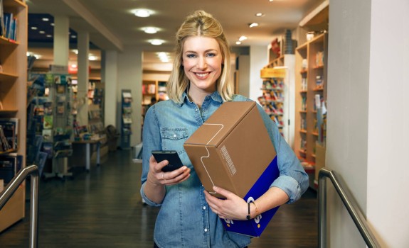 Woman with parcel and arrow