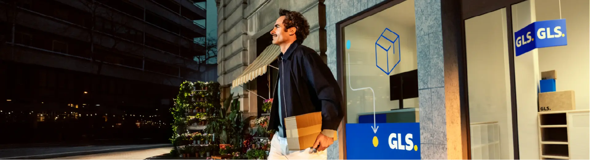 Chlap vychádzajúci z GLS Parcel Shopu